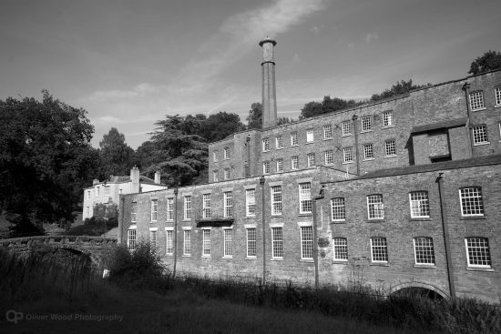 Black and white picture of a large mill.