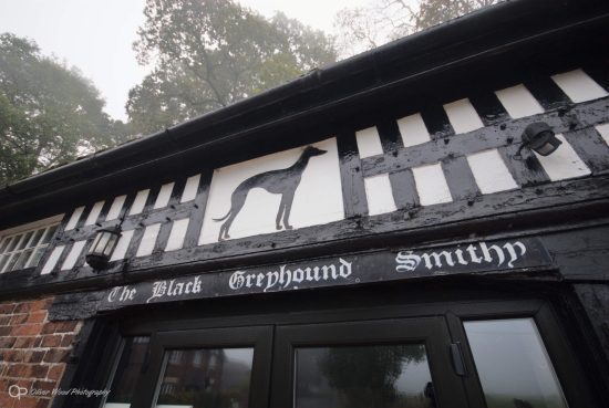 Black Greyhound Smithy - Tudor decoration in black and white timbered building. 