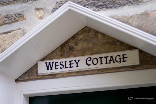 Wesley cottage name over a door. 